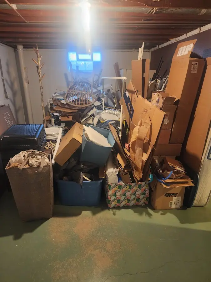 Roll-off dumpster container at job site for 15 Yard Dumpster Rental in Stonecrest